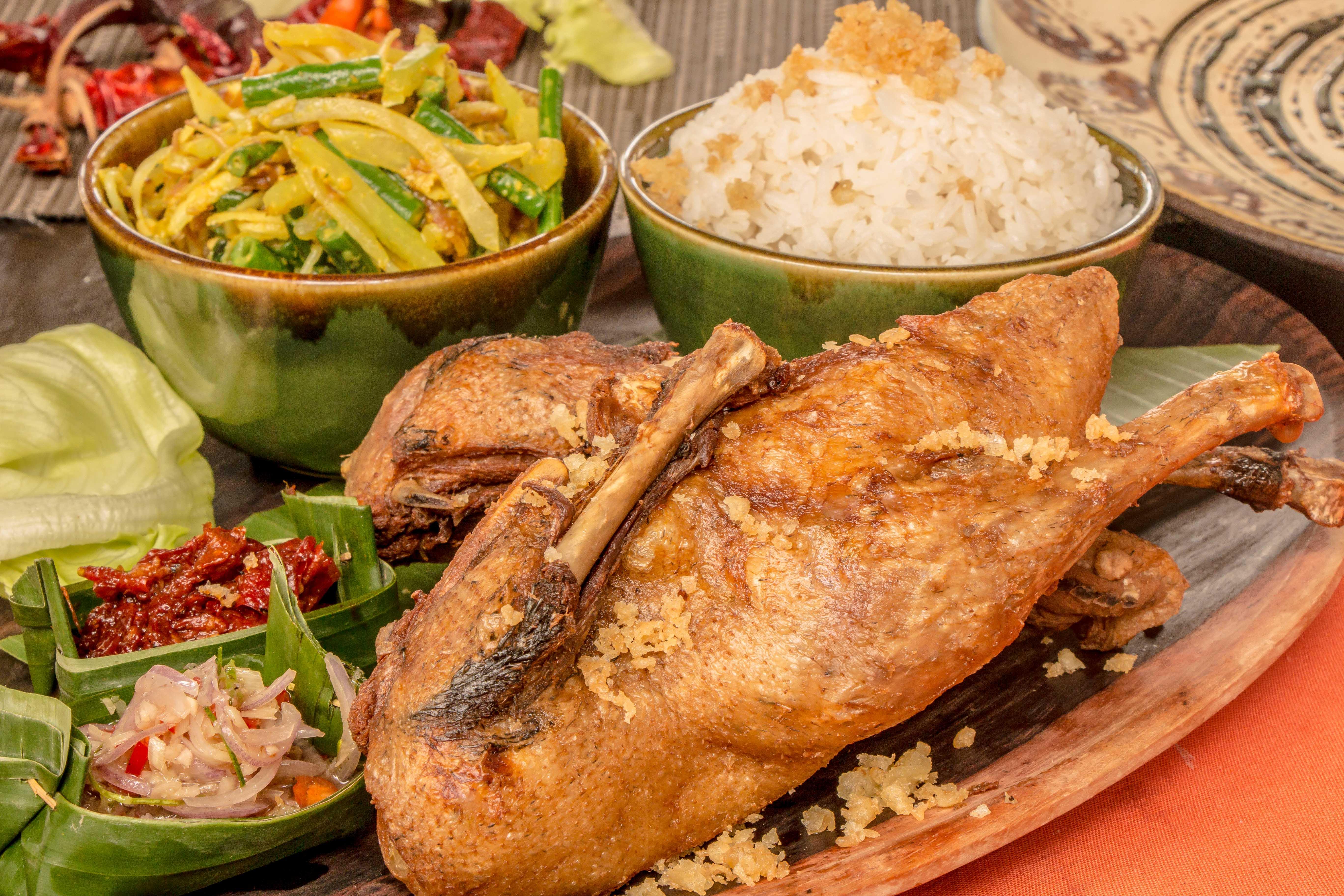Montigo Resorts Seminyak Exterior foto Fried fish with rice