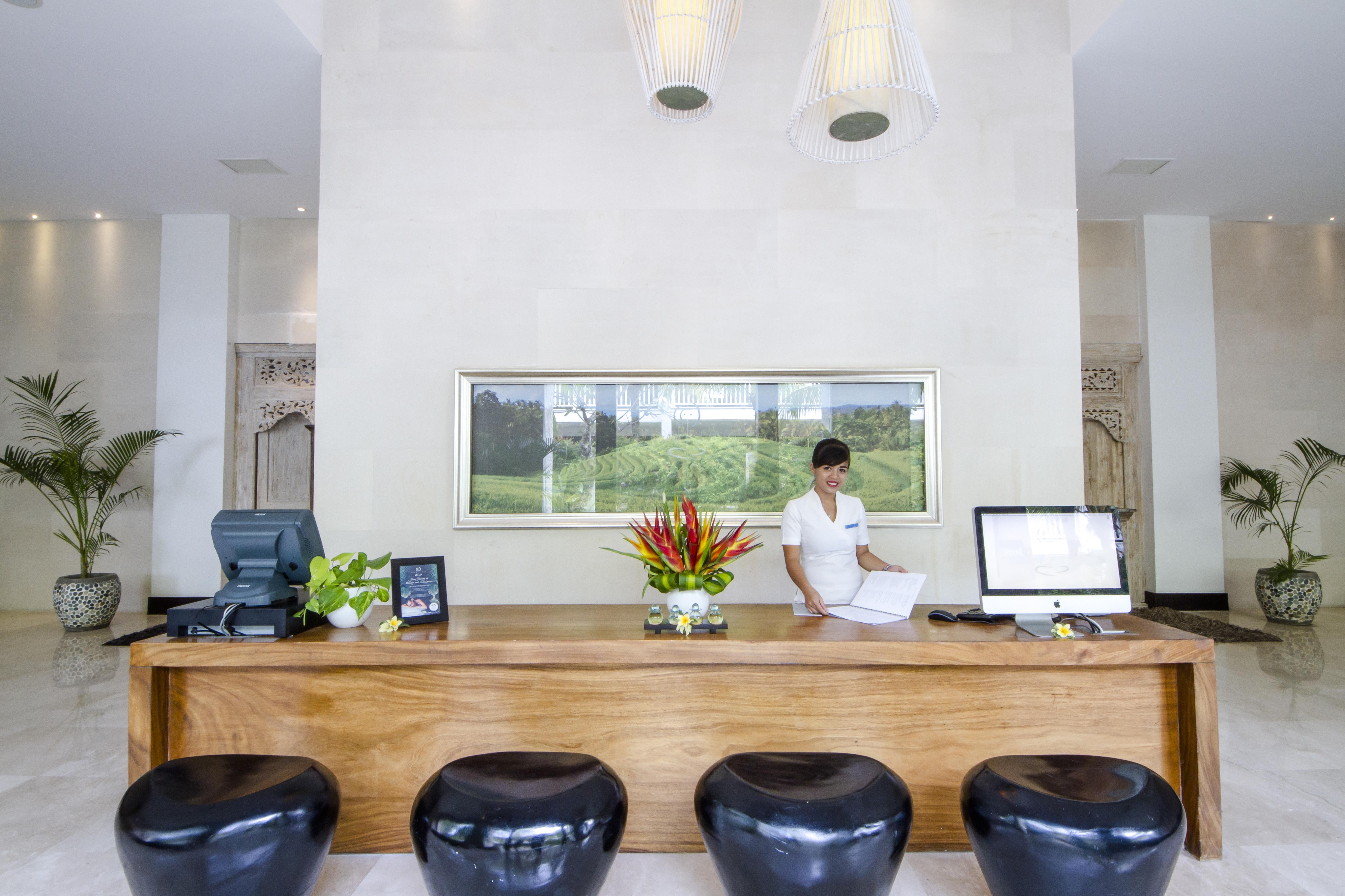 Montigo Resorts Seminyak Exterior foto Reception desk at a resort